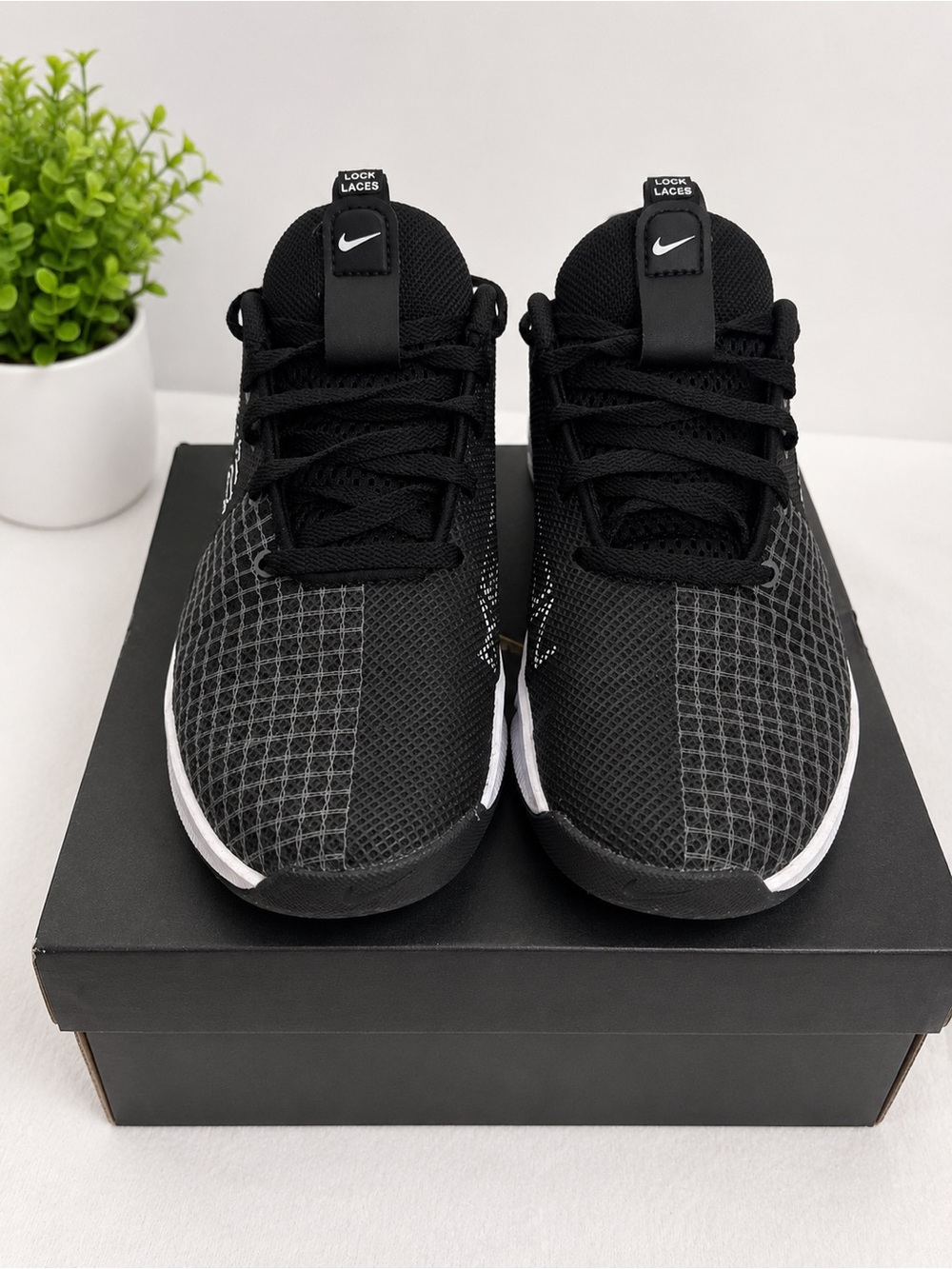 Nike Kids Black Mesh Athletic Sneakers with White Accents